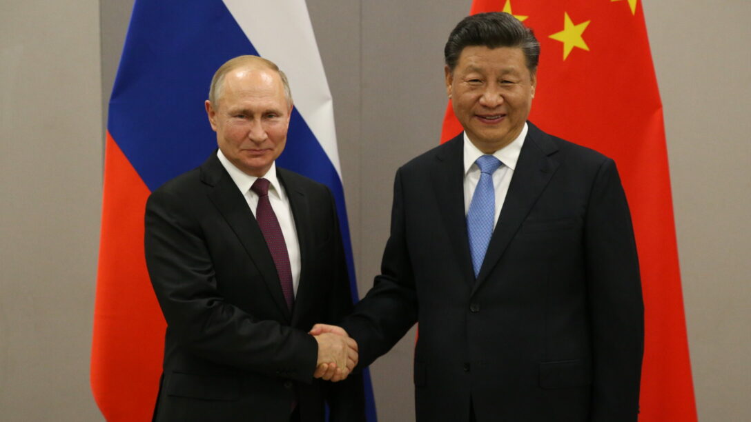Russian President Vladimir Putin meets Chinese President Xi Jinping at BRICS Summit in Brasilia