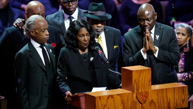 Rev. Al Sharpton alongside RowVaughn Wells and her husband, Rodney Wells, at the funeral of their 29 year-old Tyre Nichols.