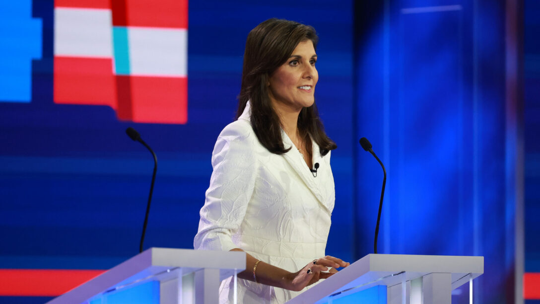 Republican presidential candidate former U.N. Ambassador Nikki Haley stands on stage during a break in the NBC News Republican Presidential Primary Debate on November 8, 2023, in Miami, Florida.