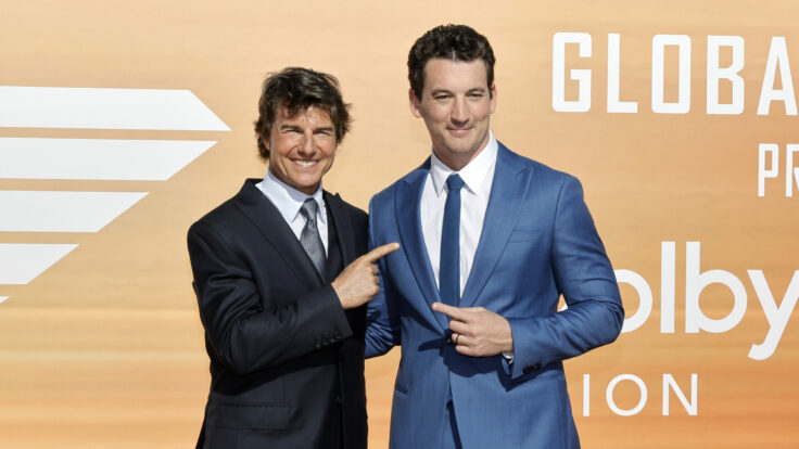 Tom Cruise and Miles Teller attend the Global Premiere of "Top Gun: Maverick" on May 4, 2022, in San Diego, California.